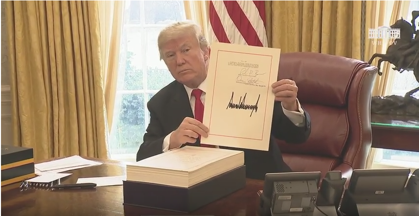 President Trump signs Tax Cuts and Jobs Act on 20171222 WH video screenshot