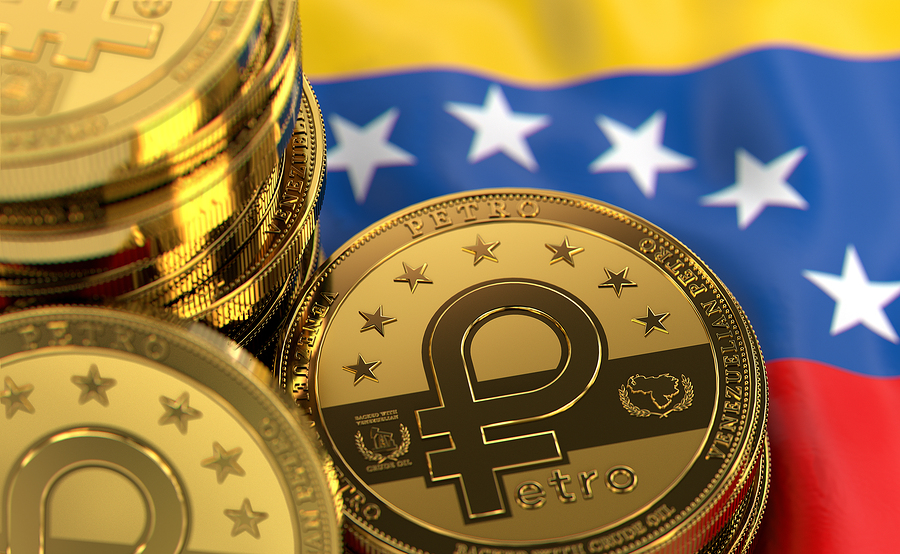 Stack of Petro concept coins on Venezuelan flag. Situation of Petro the cryptocurrency of
