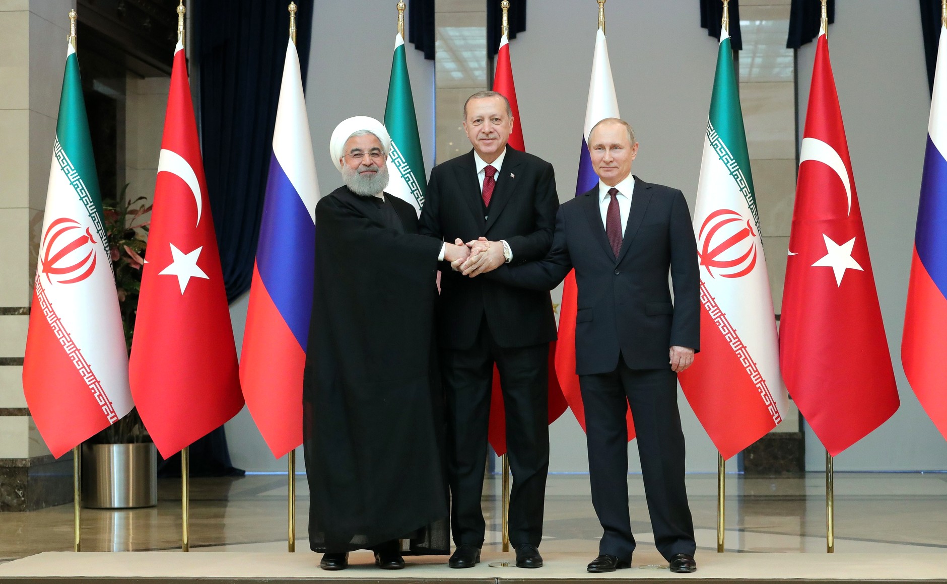 Russian President Vladimir Putin With President of Iran Hassan Rouhani (left) and President of Turkey Recep Tayyip Erdogan before the trilateral meeting in Ankara, Turkey April 3-4, 2018